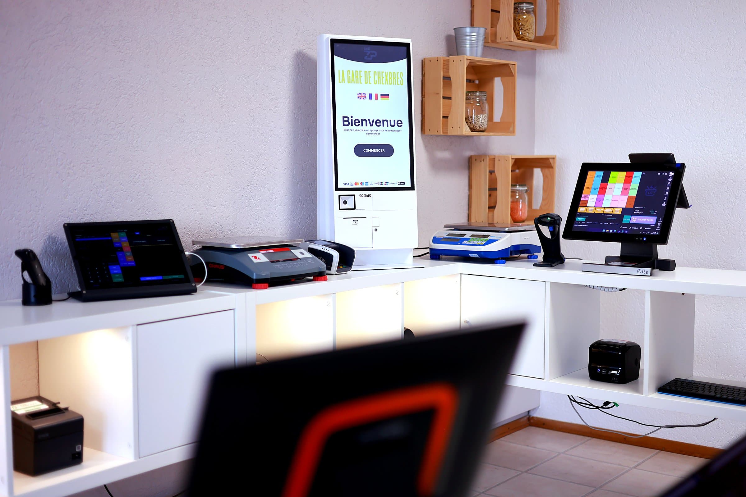 Le showroom DCSA à Crissier, avec bornes de commande, écrans de caisse ZPPOS et balances connectées